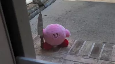 kirby with a knife